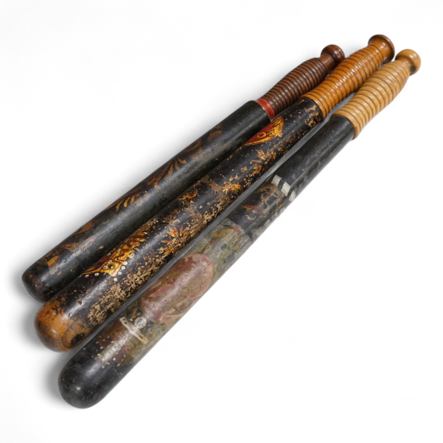 A Victorian Scottish Special Constable’s turned and painted wood truncheon, and two other Victorian Police truncheons, largest 46cm in length (3)